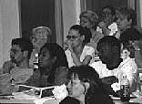 Photograph of several diverse students attending a seminar at the National Victim Assistance Academy.